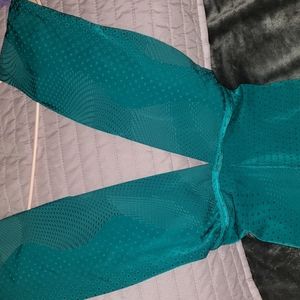 SHANE JUSTIN JUMPSUIT IN TEAL . No size tags . Best fits a xs or small